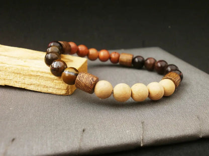 Pulsera de Éxito Orgánico: Ojo de Tigre Dual y Madera Sagrada para el Líder con Visión de Futuro - My Cuqui