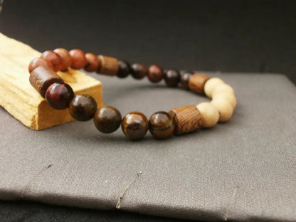 Pulsera de Éxito Orgánico: Ojo de Tigre Dual y Madera Sagrada para el Líder con Visión de Futuro - My Cuqui