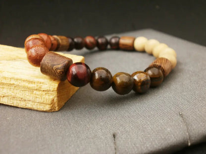 Pulsera de Éxito Orgánico: Ojo de Tigre Dual y Madera Sagrada para el Líder con Visión de Futuro - My Cuqui