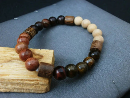 Pulsera de Éxito Orgánico: Ojo de Tigre Dual y Madera Sagrada para el Líder con Visión de Futuro - My Cuqui