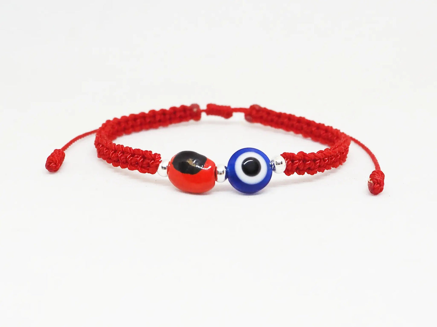 Pulsera Hilo Rojo con Ojo Turco y Cuenta Huayruro (Cerámica) - My Cuqui Shop